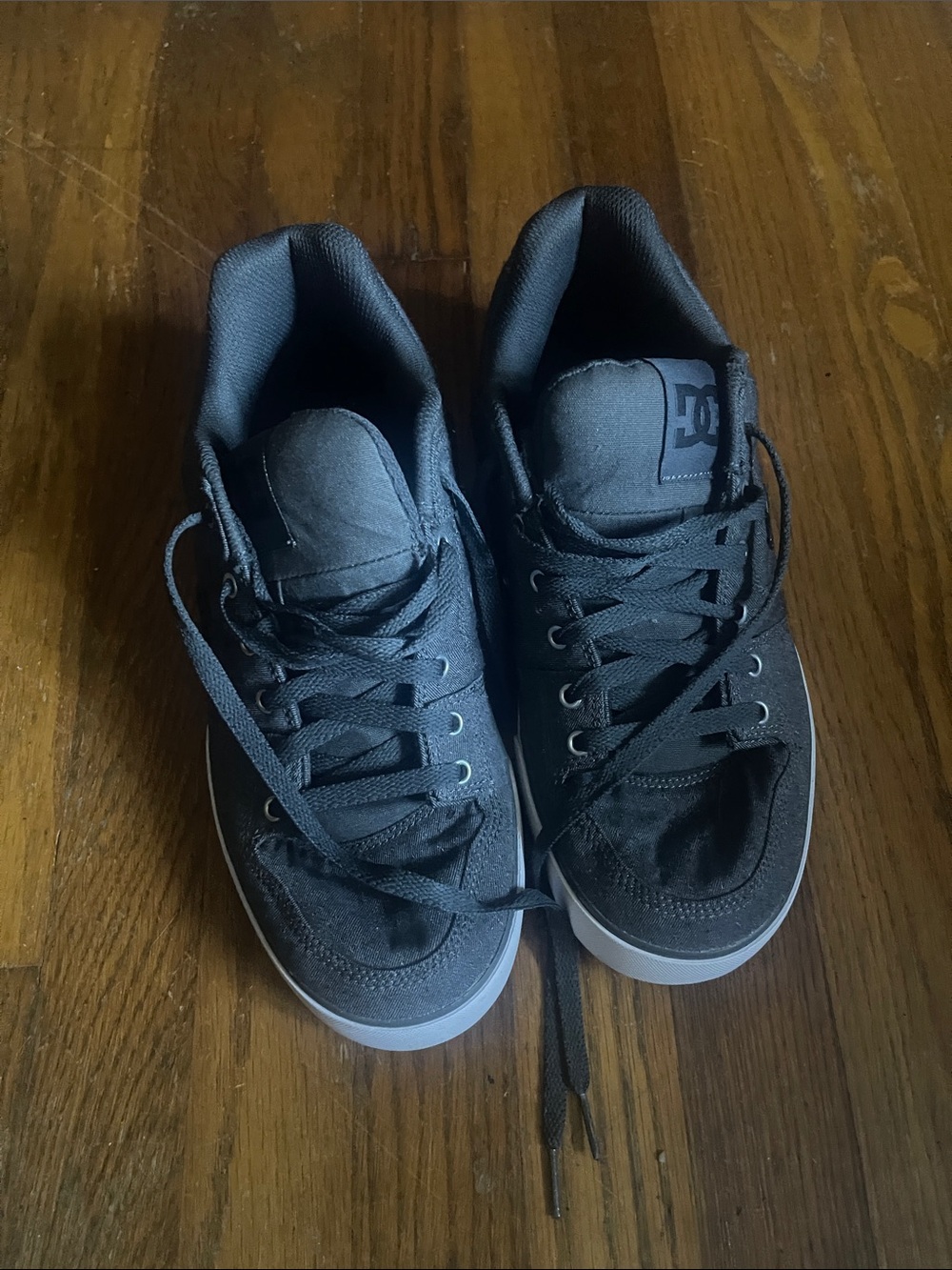 DC Black Low-Top Skate Sneakers with White Sole Trim